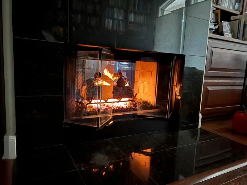 Double-sided gas fireplace installation in Bastrop, TX