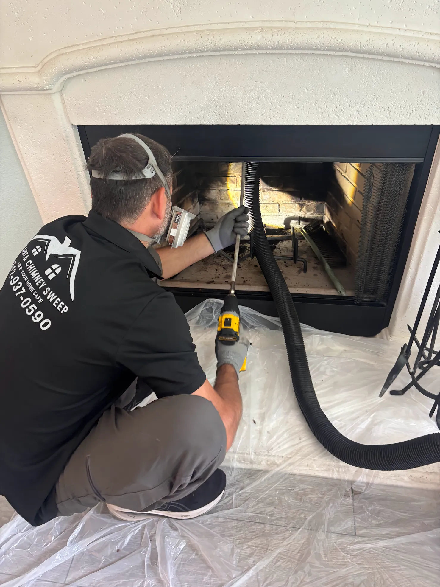 Fireplace interior prepared for professional cleaning